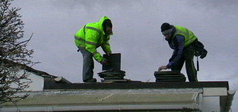 Workmen on roof.